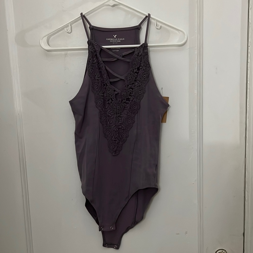 Purple body suit